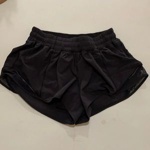 Black lulu hotty hot running shorts.